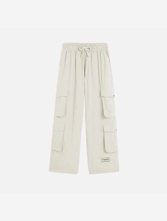 The Giving Movement Off White Shell Wide Leg Pocket Pants